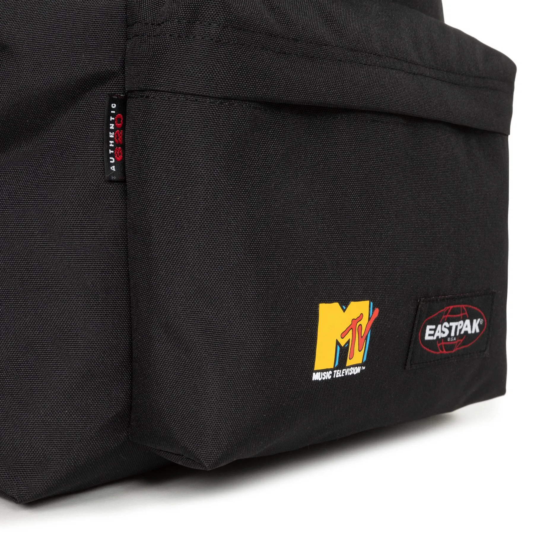 MOCHILA EASTPAK Padded Pak’r® 24 litros EK620L90 MTV Sound System negra retro años 80 radio auriculares