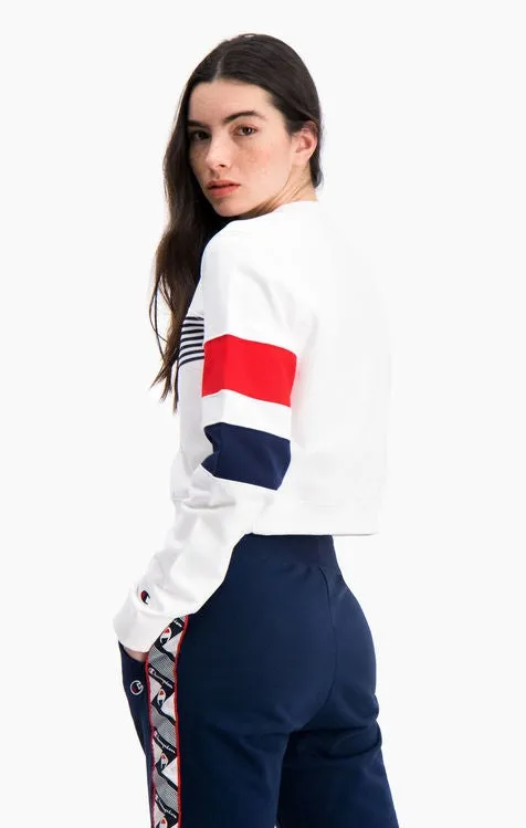 Sudadera CHAMPION chica cuello redondo GRAPHIC STRIPE AND COLOUR BLOCK CROPPED SWEATSHIRT Ref. 112761 Blanca, azules y roja